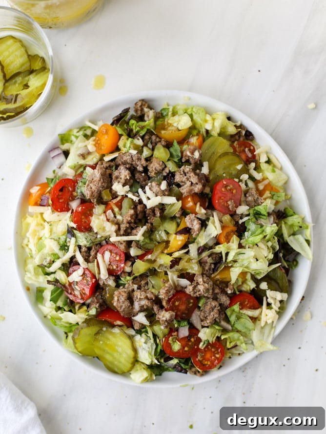 cheeseburger chopped salad I howsweeteats.com #cheeseburger #chopped #salad #dill #pickle #dressing