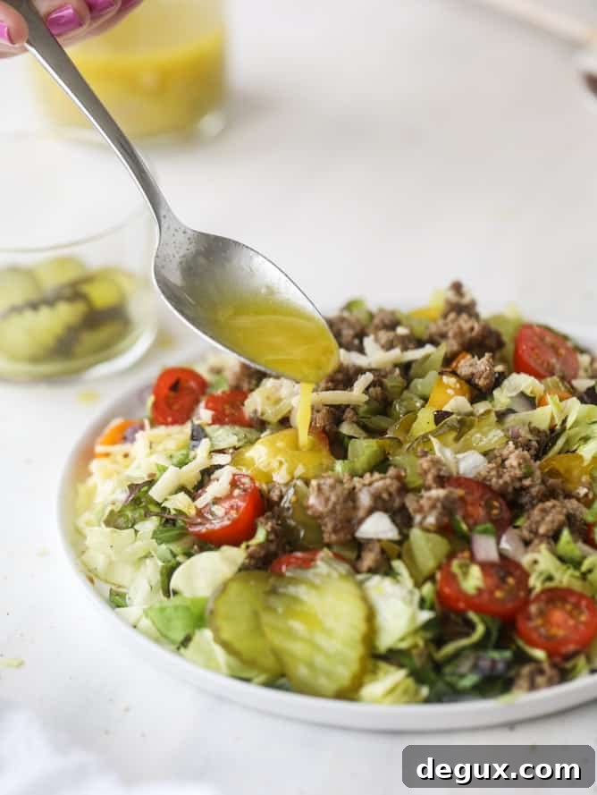 cheeseburger chopped salad I howsweeteats.com #cheeseburger #chopped #salad #dill #pickle #dressing