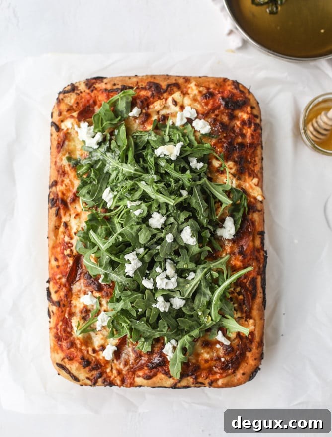 hot honey goat cheese pepperoni pizza I howsweeteats.com #detroitstyle #pepperoni #pizza #goatcheese 