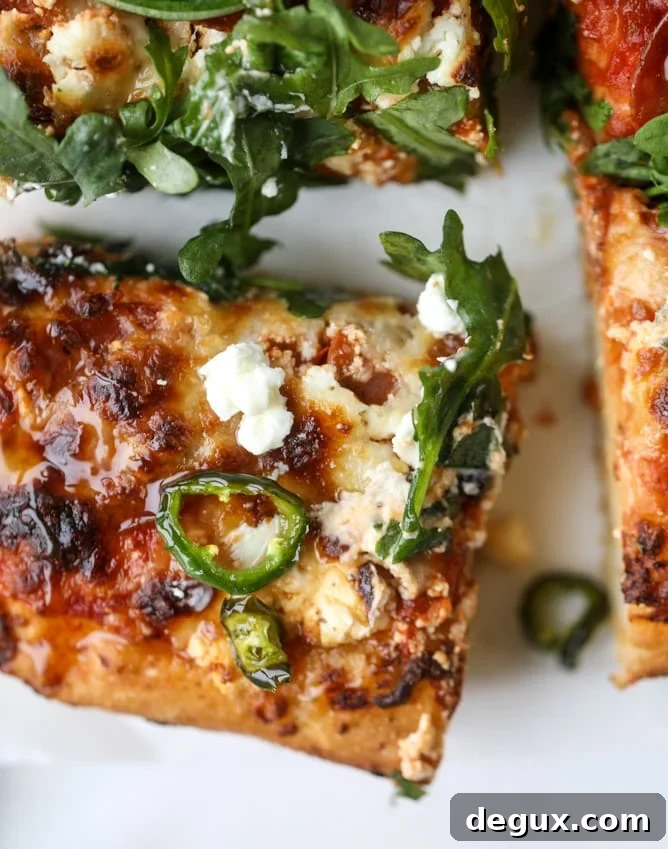 hot honey goat cheese pepperoni pizza I howsweeteats.com #detroitstyle #pepperoni #pizza #goatcheese 
