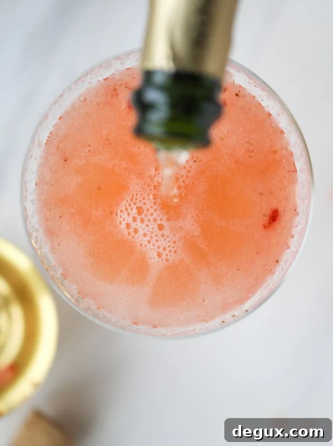 strawberry champagne tequila fizz I howsweeteats.com #strawberry #champagne #tequila #cocktail #jalapeno
