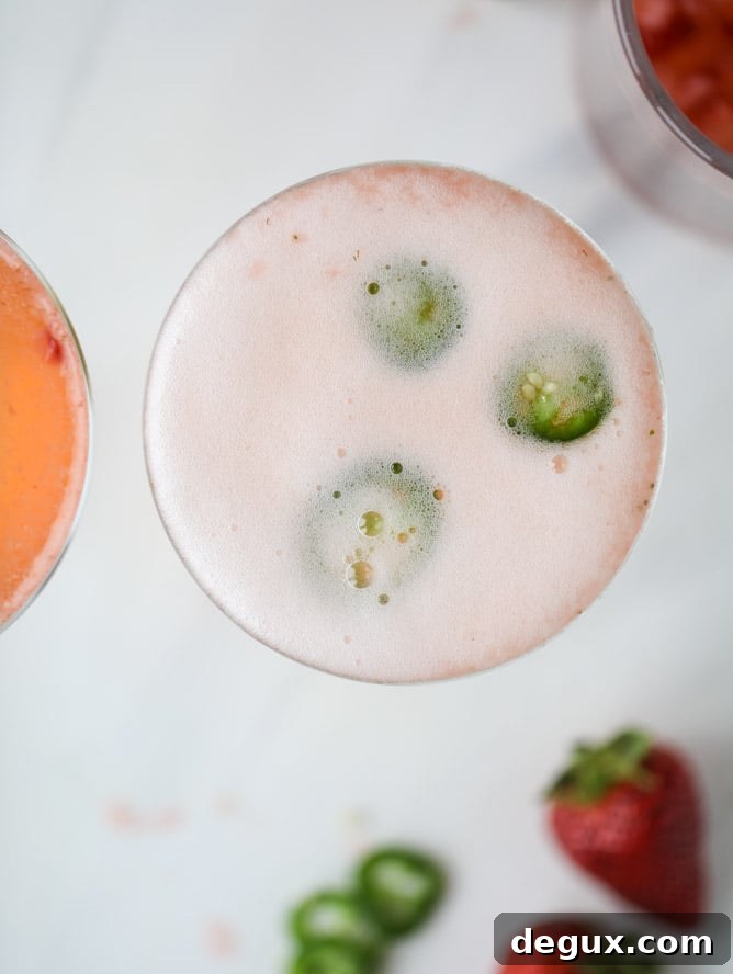 Strawberry Champagne Tequila Fizz Cocktail Recipe 7 strawberry champagne tequila fizz I howsweeteats.com #strawberry #champagne #tequila #cocktail #jalapeno