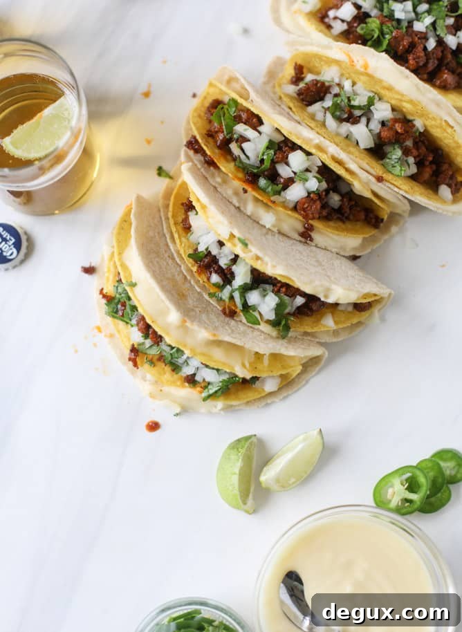 queso fundido tacos I howsweeteats.com #tacos #chorizo #queso #quesofundido