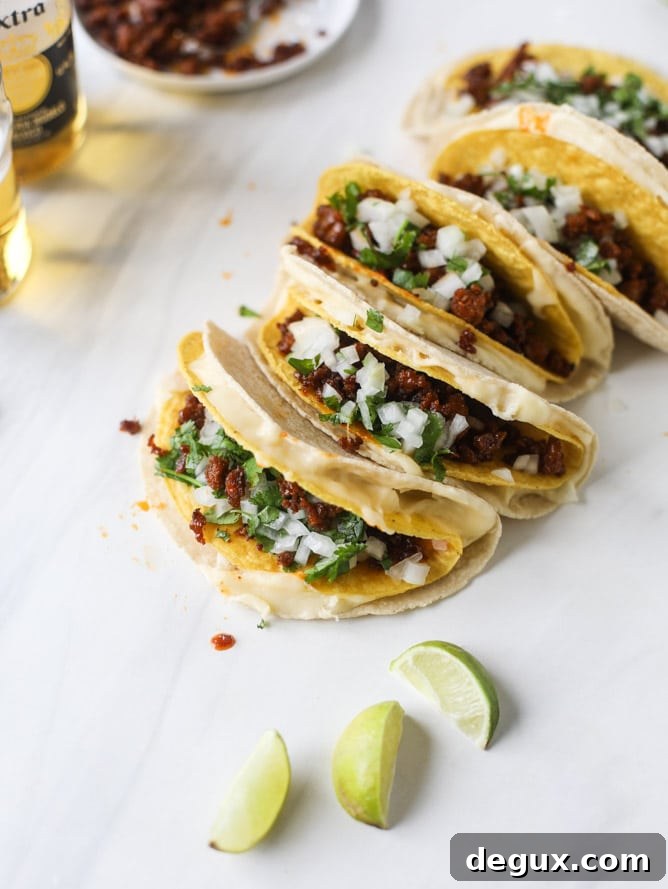 queso fundido tacos I howsweeteats.com #tacos #chorizo #queso #quesofundido
