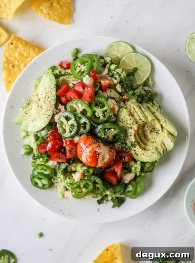 Lobster Guacamole Recipe: Creamy Lobster Avocado Dip for Parties 8 lobster guacamole I howsweeteats.com #lobster #guacamole #avocado #seafood #dip