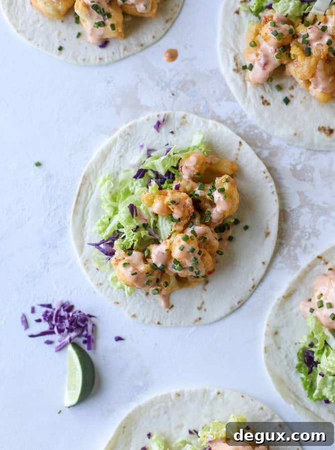 Bang Bang Cauliflower Tacos Recipe — Spicy Crispy Plant-Based Tacos 5 bang bang cauliflower tacos I howsweeteats.com #bangbang #cauliflower #tacos #vegetarian