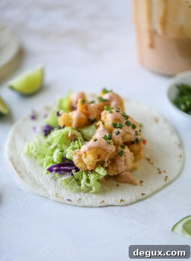 Bang Bang Cauliflower Tacos Recipe — Spicy Crispy Plant-Based Tacos 6 bang bang cauliflower tacos I howsweeteats.com #bangbang #cauliflower #tacos #vegetarian