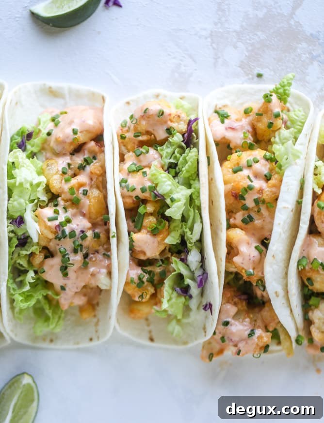 Bang Bang Cauliflower Tacos Recipe — Spicy Crispy Plant-Based Tacos 8 bang bang cauliflower tacos I howsweeteats.com #bangbang #cauliflower #tacos #vegetarian