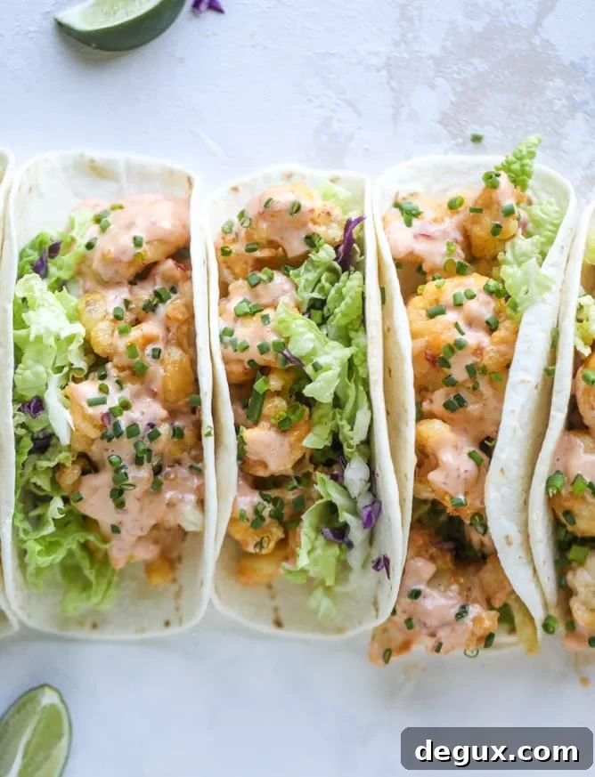 Spicy Bang Bang Cauliflower Tacos with Creamy Sriracha Sauce 8 bang bang cauliflower tacos I howsweeteats.com #bangbang #cauliflower #tacos #vegetarian