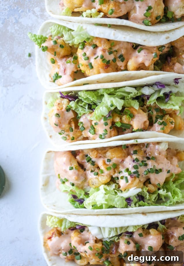 Bang Bang Cauliflower Tacos Recipe — Spicy Crispy Plant-Based Tacos 10 bang bang cauliflower tacos I howsweeteats.com #bangbang #cauliflower #tacos #vegetarian