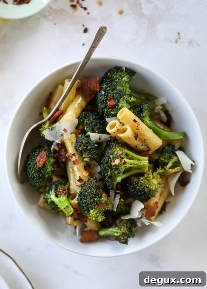 Weeknight Bacon and Broccoli Pasta Recipe 2 This is the easiest weeknight bacon broccoli pasta that can come together in minutes! Super flavorful and filled with crispy bacon, fresh broccoli, shaved parmesan and crushed red pepper, it's delicious on its own or as a base for more veggies or meat! I howsweeteats.com #bacon #broccoli #pasta #easy #dinner #recipes