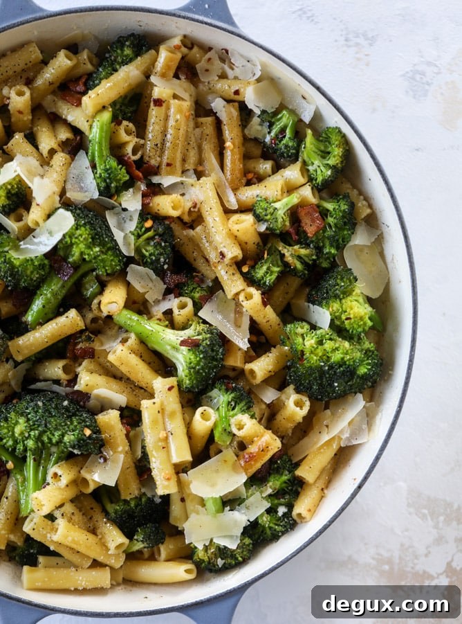 Weeknight Bacon and Broccoli Pasta Recipe 5 This is the easiest weeknight bacon broccoli pasta that can come together in minutes! Super flavorful and filled with crispy bacon, fresh broccoli, shaved parmesan and crushed red pepper, it's delicious on its own or as a base for more veggies or meat! I howsweeteats.com #bacon #broccoli #pasta #easy #dinner #recipes
