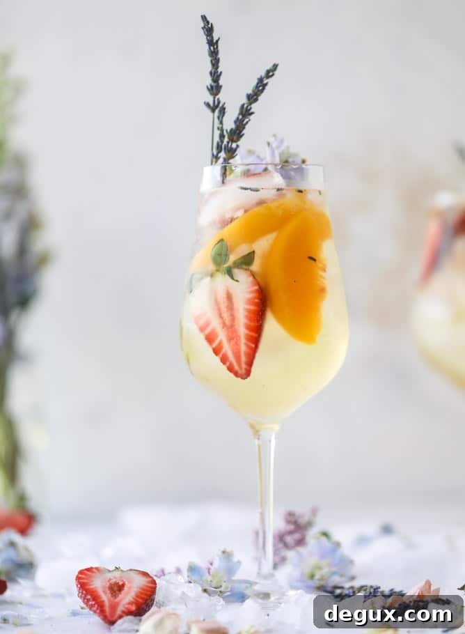 Lavender Sangria Recipe: Floral Wine Punch for Entertaining 5 lavender sangria I howsweeteats.com #lavender #whitewine #sangria #cocktails