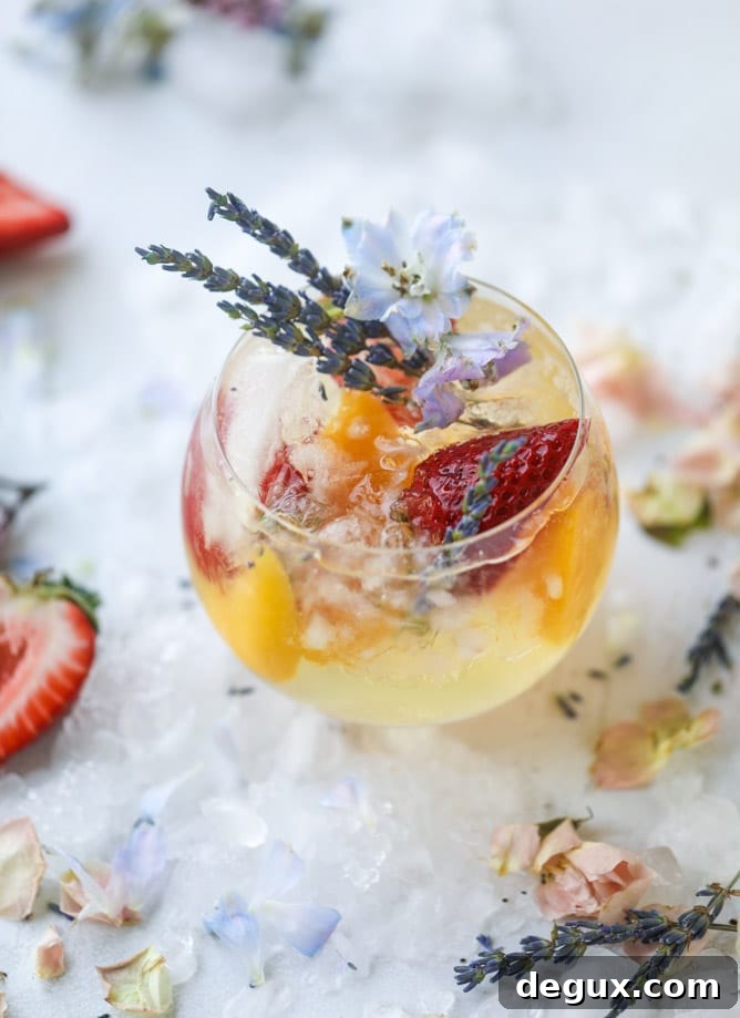 Lavender Sangria Recipe: Floral Wine Punch for Entertaining 6 lavender sangria I howsweeteats.com #lavender #whitewine #sangria #cocktails