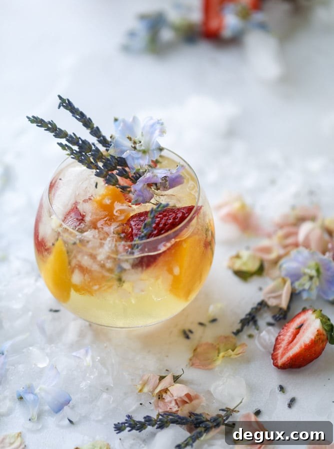 Lavender Sangria Recipe: Floral Wine Punch for Entertaining 7 lavender sangria I howsweeteats.com #lavender #whitewine #sangria #cocktails