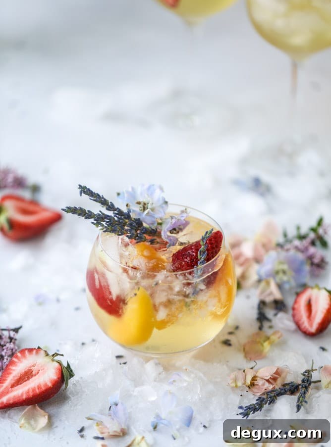 Lavender Sangria Recipe: Floral Wine Punch for Entertaining 9 lavender sangria I howsweeteats.com #lavender #whitewine #sangria #cocktails