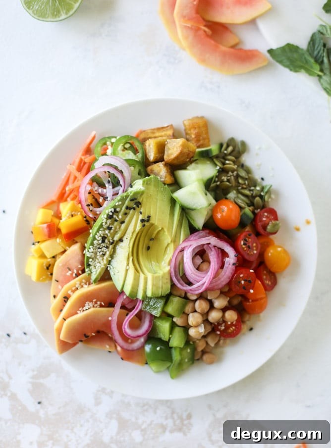 Zesty Rainbow Salad with Spicy Chili-Lime Dressing 5 This spicy rainbow salad is chock full of gorgeous, fresh produces, chickpeas, plantains and herbs for one beautiful sight in a bowl.