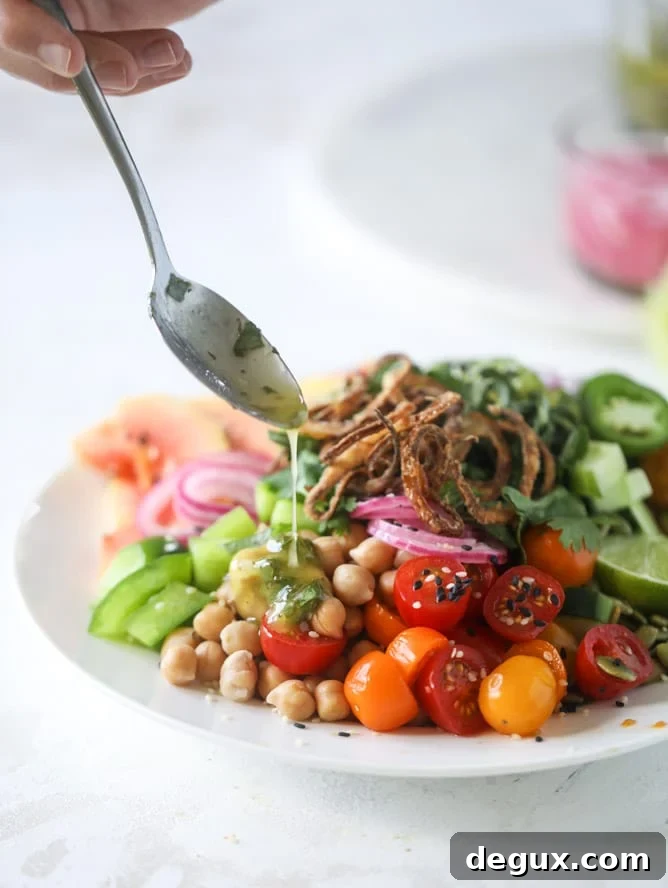 Zesty Rainbow Salad with Spicy Chili-Lime Dressing 7 This spicy rainbow salad is chock full of gorgeous, fresh produces, chickpeas, plantains and herbs for one beautiful sight in a bowl.