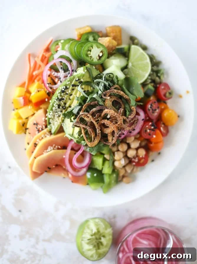 Zesty Rainbow Salad with Spicy Chili-Lime Dressing 9 This spicy rainbow salad is chock full of gorgeous, fresh produces, chickpeas, plantains and herbs for one beautiful sight in a bowl.