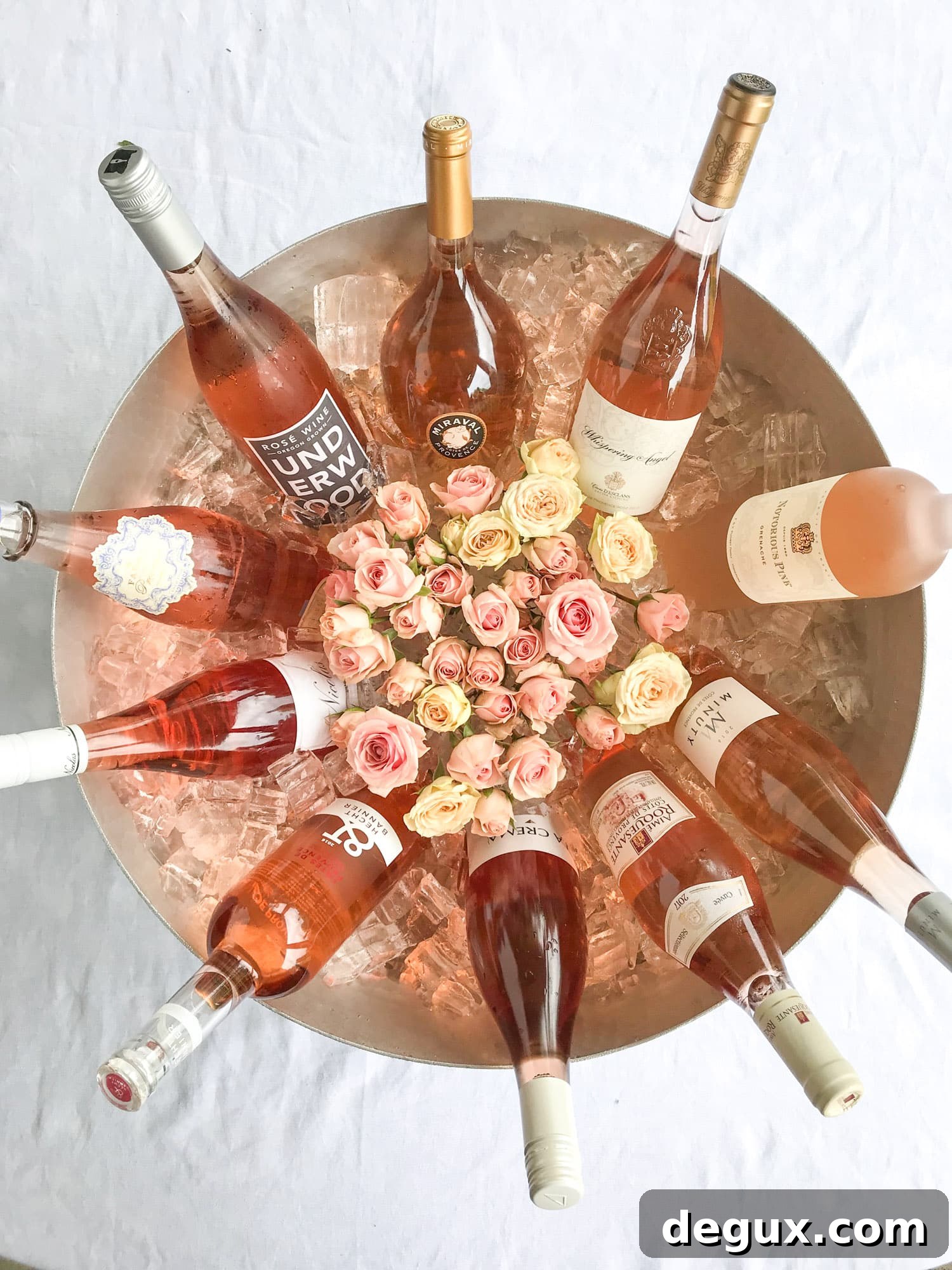 The best rosé to drink - all here in one epic summer guide for you! I'm sharing my personal favorite top ten rosé wines to drink in summer 2018, along with the perfect cheese board and snacks to go with. I howsweeteats.com #rosé #rose #summer #2018 #cheeseboard 
