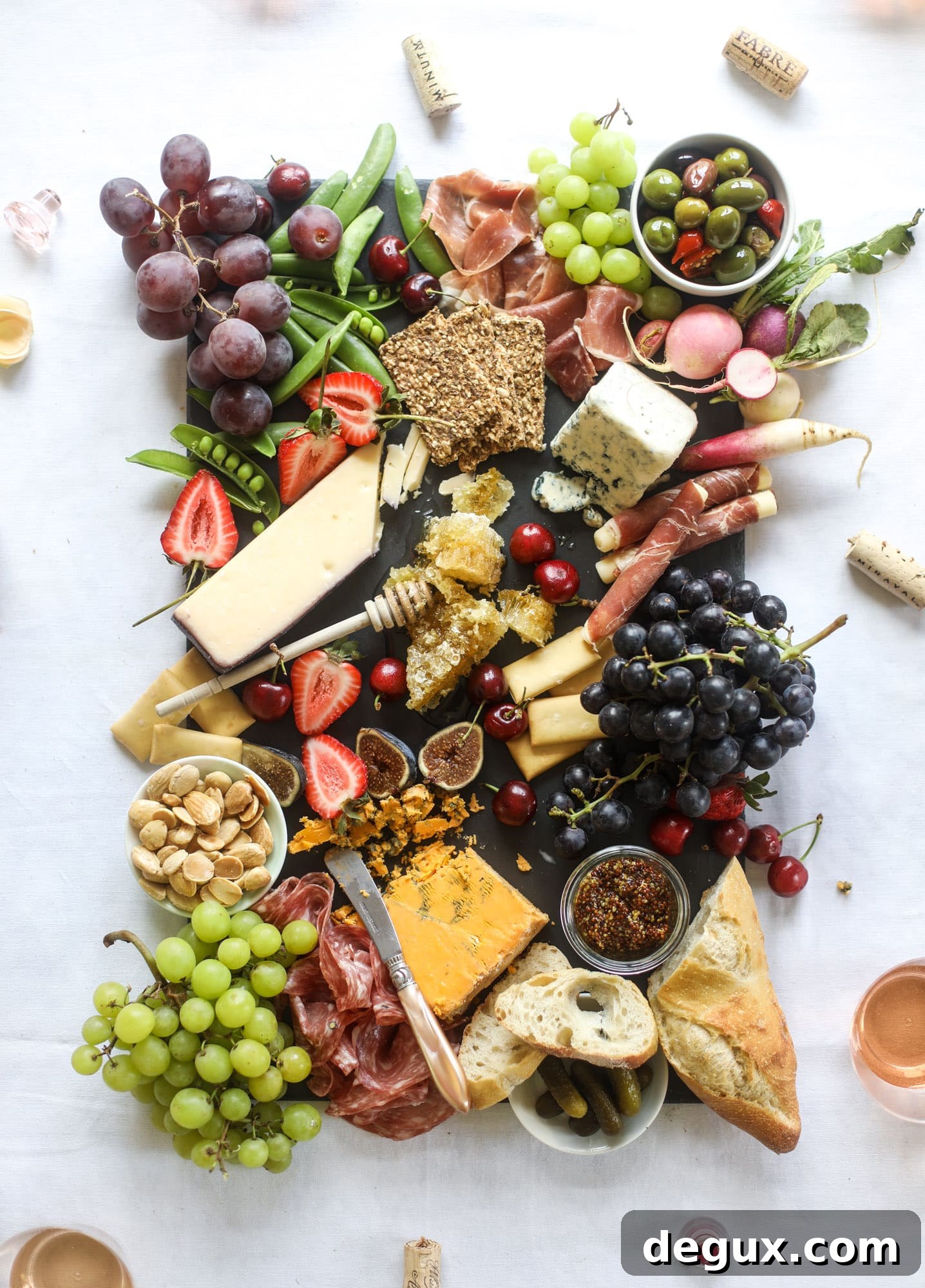 The best rosé to drink - all here in one epic summer guide for you! I'm sharing my personal favorite top ten rosé wines to drink in summer 2018, along with the perfect cheese board and snacks to go with. I howsweeteats.com #rosé #rose #summer #2018 #cheeseboard 