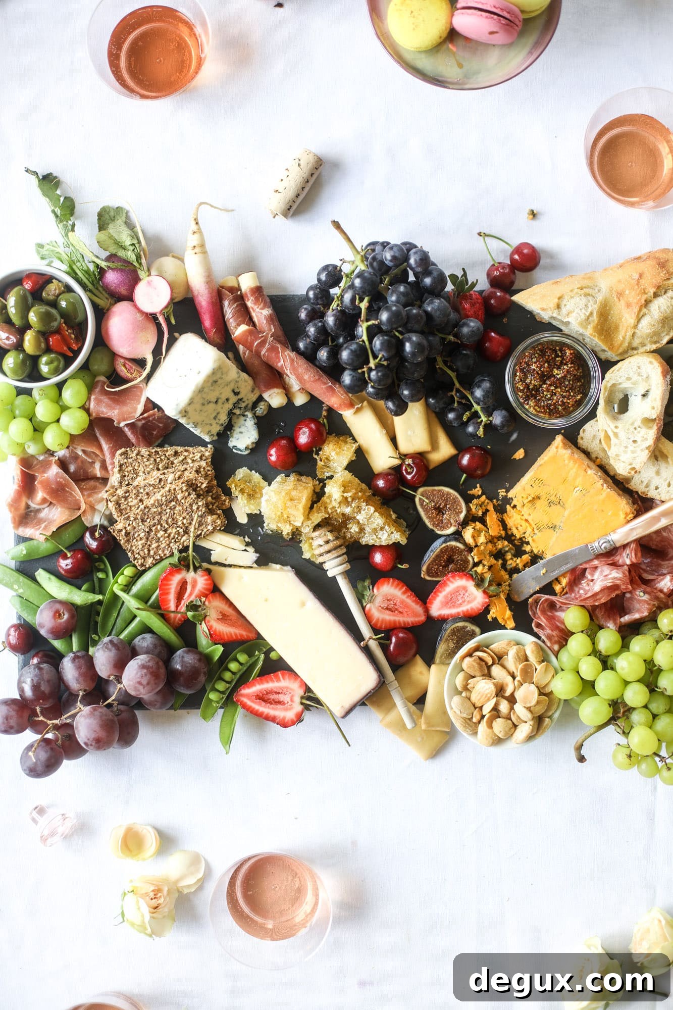 The best rosé to drink - all here in one epic summer guide for you! I'm sharing my personal favorite top ten rosé wines to drink in summer 2018, along with the perfect cheese board and snacks to go with. I howsweeteats.com #rosé #rose #summer #2018 #cheeseboard 