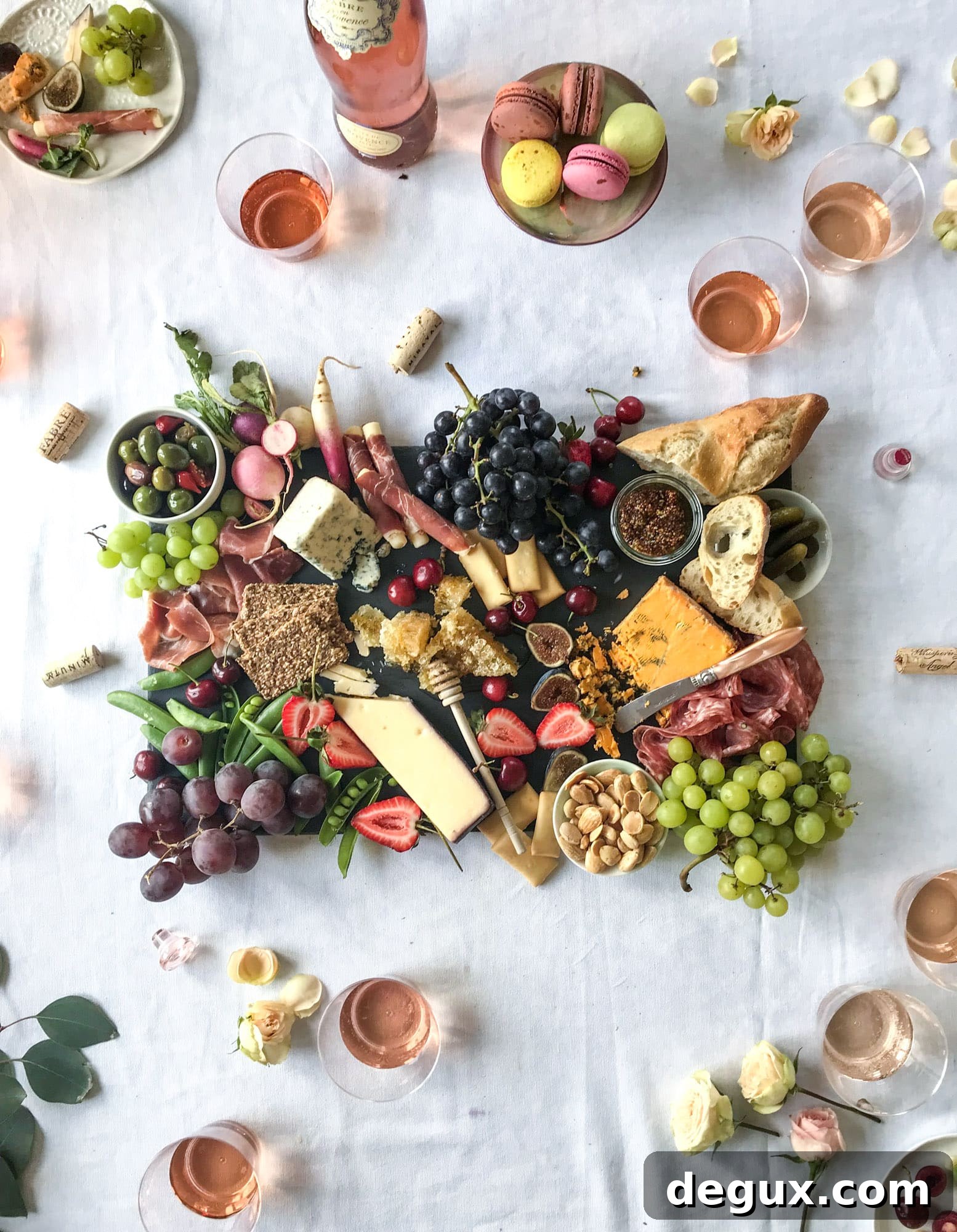 The best rosé to drink - all here in one epic summer guide for you! I'm sharing my personal favorite top ten rosé wines to drink in summer 2018, along with the perfect cheese board and snacks to go with. I howsweeteats.com #rosé #rose #summer #2018 #cheeseboard 