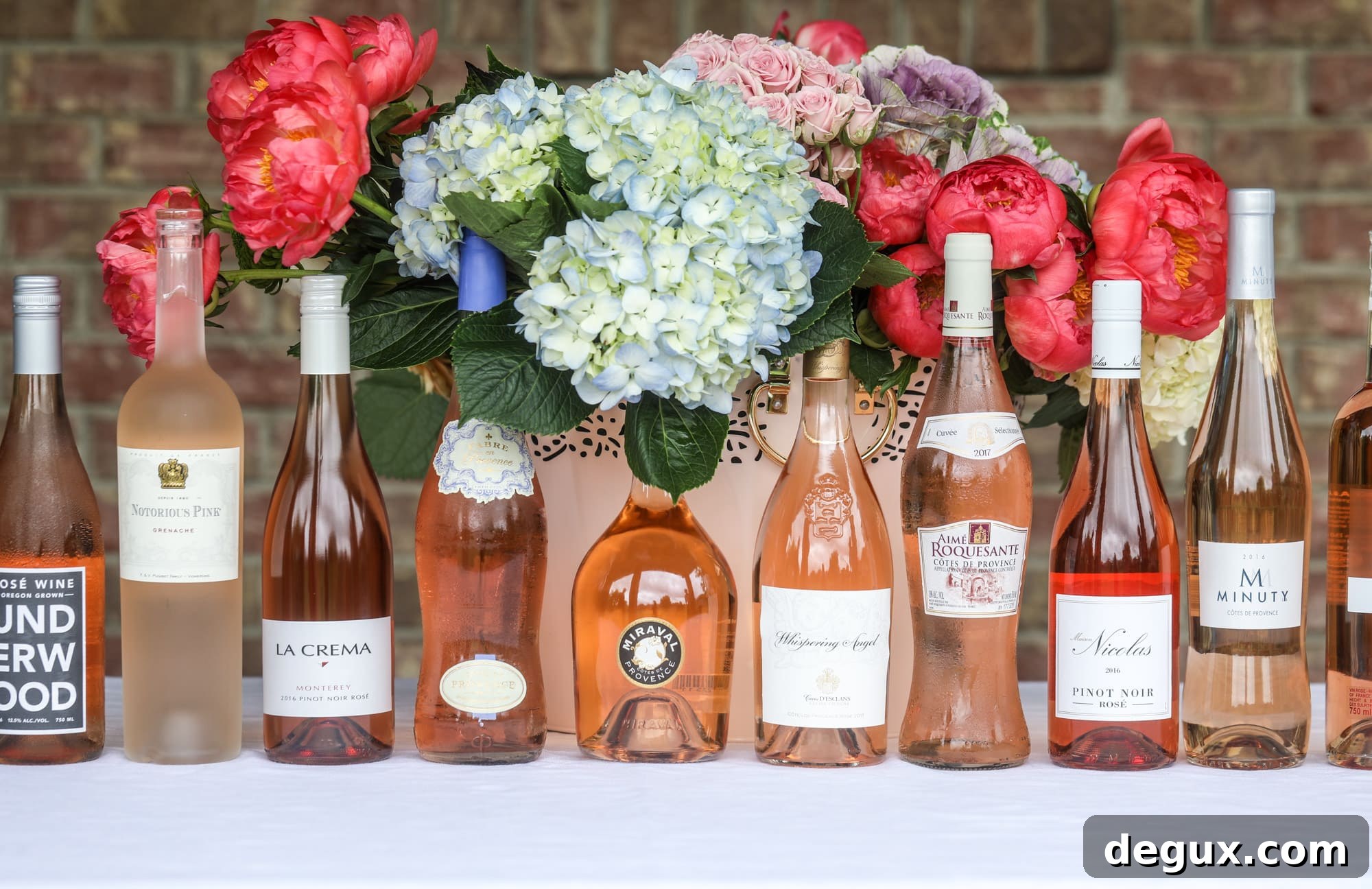The best rosé to drink - all here in one epic summer guide for you! I'm sharing my personal favorite top ten rosé wines to drink in summer 2018, along with the perfect cheese board and snacks to go with. I howsweeteats.com #rosé #rose #summer #2018 #cheeseboard 