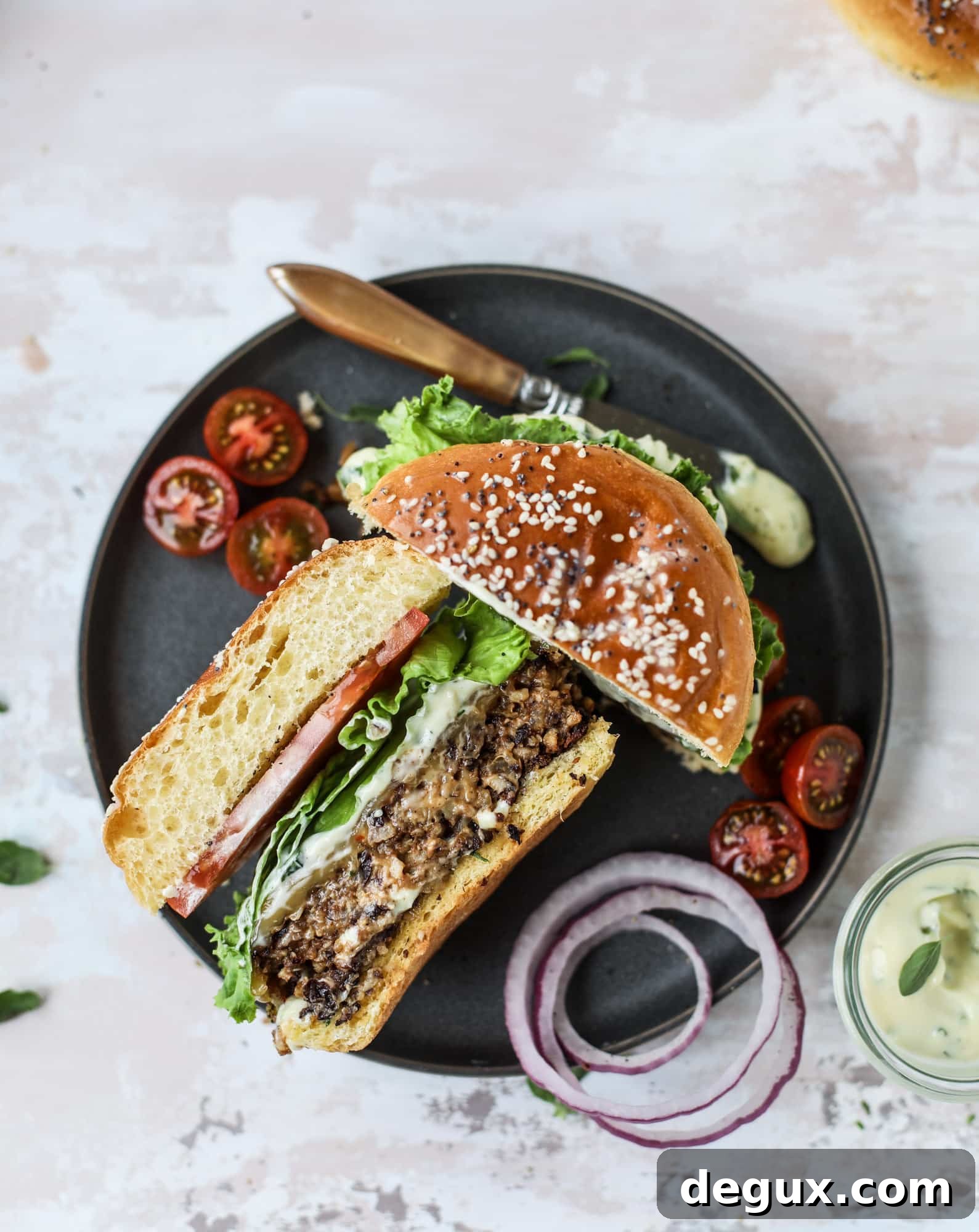 Irresistible Veggie Burgers with Garlic-Herb Mayo 10 This is the best ever veggie burger and that is not an exaggeration! It's delicious, full of texture and chew, super satisfying and actually sticks together in the pan. You can serve it on buns, make a patty melt, a salad or lettuce wraps - perfection! I howsweeteats.com #best #veggie #burger #vegetarian #beans #quinoa