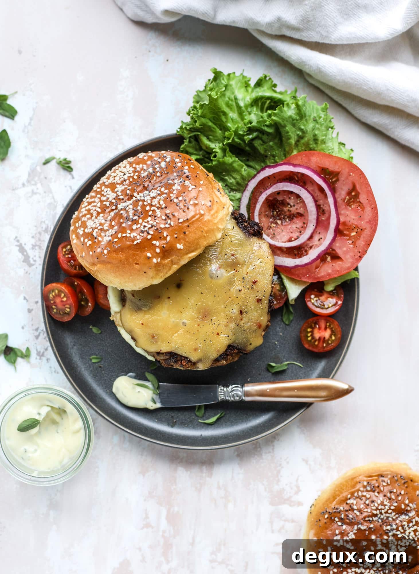 Irresistible Veggie Burgers with Garlic-Herb Mayo 6 This is the best ever veggie burger and that is not an exaggeration! It's delicious, full of texture and chew, super satisfying and actually sticks together in the pan. You can serve it on buns, make a patty melt, a salad or lettuce wraps - perfection! I howsweeteats.com #best #veggie #burger #vegetarian #beans #quinoa
