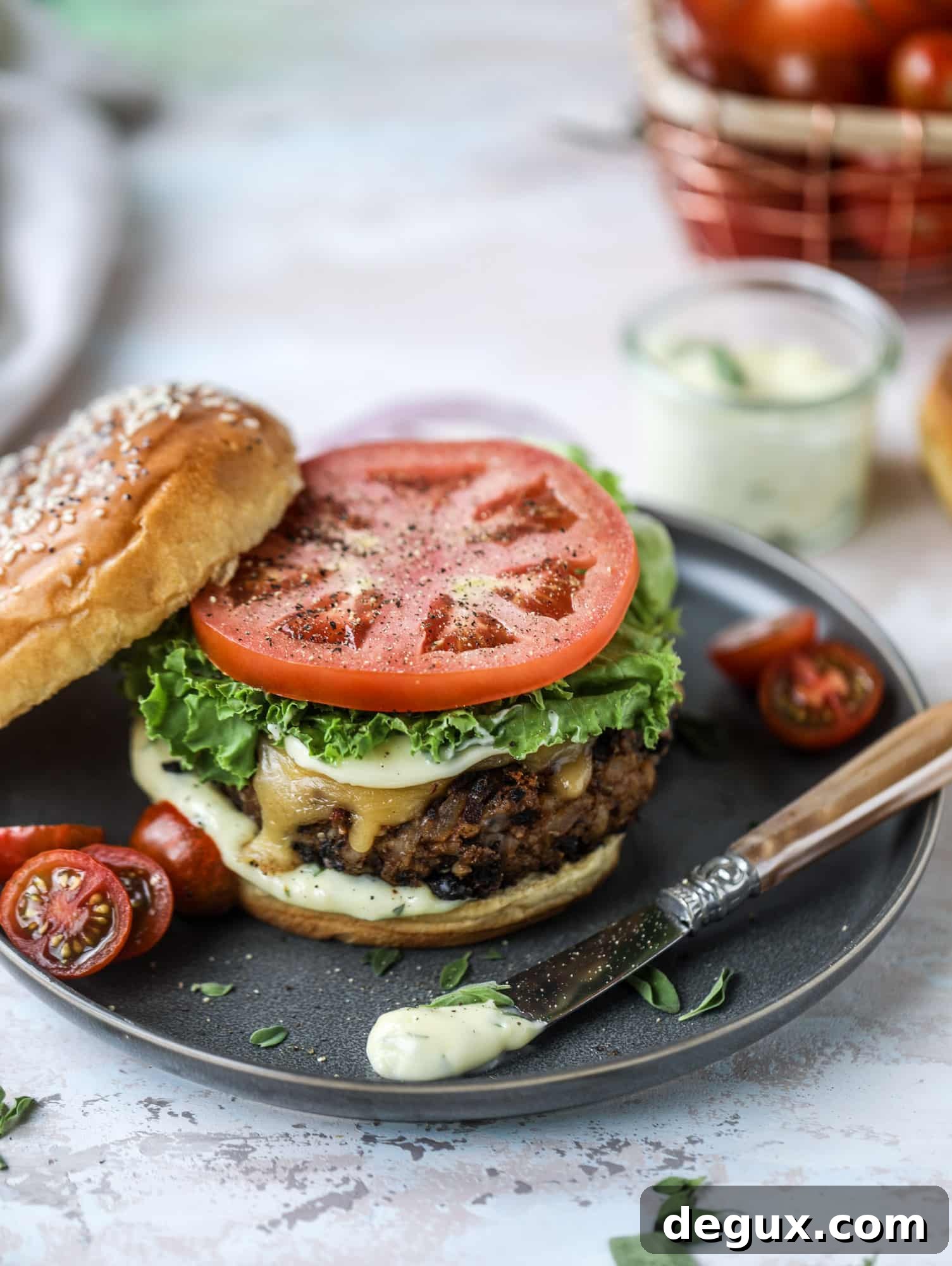 Irresistible Veggie Burgers with Garlic-Herb Mayo 7 This is the best ever veggie burger and that is not an exaggeration! It's delicious, full of texture and chew, super satisfying and actually sticks together in the pan. You can serve it on buns, make a patty melt, a salad or lettuce wraps - perfection! I howsweeteats.com #best #veggie #burger #vegetarian #beans #quinoa