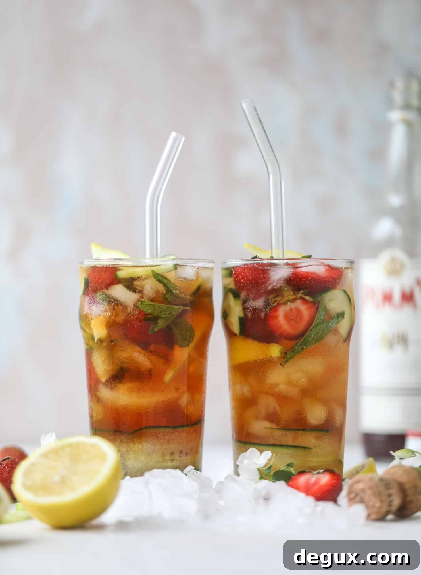 Sparkling Rosé Pimm’s Cups Recipe for Summer Cocktails 8 I love a delicious Pimm's Cup in the heart of summer! This was is topped with sparkling rosé wine and filled with strawberries, cucumbers and lemon wedges. It's super refreshing and perfect on hot hot days! I howsweeteats.com #pimms #cup #recipe #cocktails #rosé #sparkling #summer