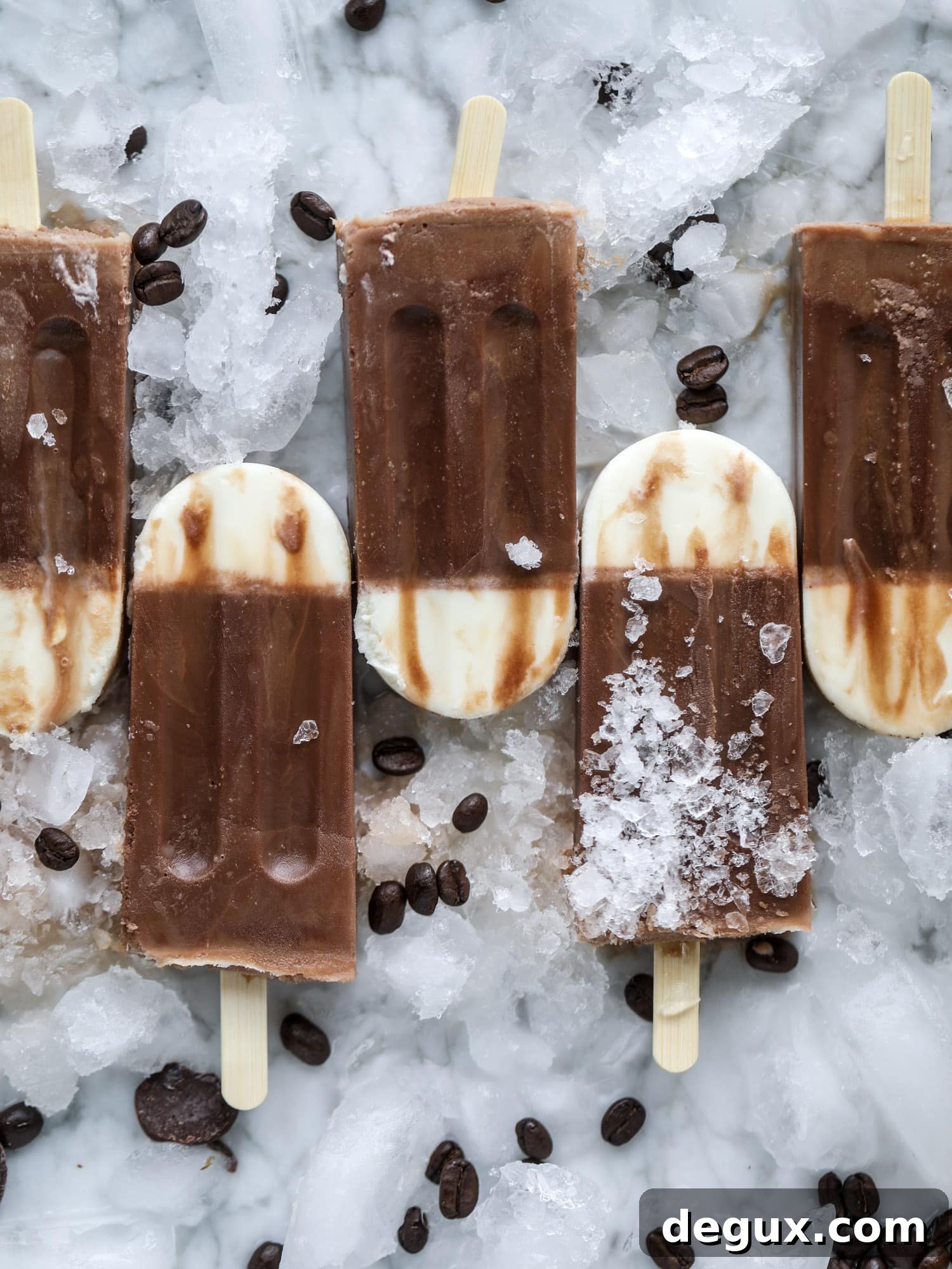 Sweet Cream Cold Brew Fudgesicle Recipe for Coffee Lovers 5 These fudgesicles are made with cold brew and dutch process cocoa for the most fun grown-up popsicle that can also deliver a little caffeine jolt. Topped with vanilla bean sweet cream, these are just like an iced latte in a pop! Serve as a treat or a snack!