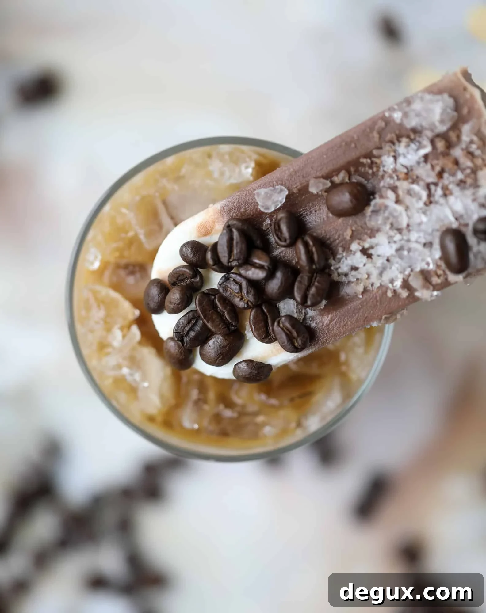 Sweet Cream Cold Brew Fudgesicle Recipe for Coffee Lovers 6 These fudgesicles are made with cold brew and dutch process cocoa for the most fun grown-up popsicle that can also deliver a little caffeine jolt. Topped with vanilla bean sweet cream, these are just like an iced latte in a pop! Serve as a treat or a snack!