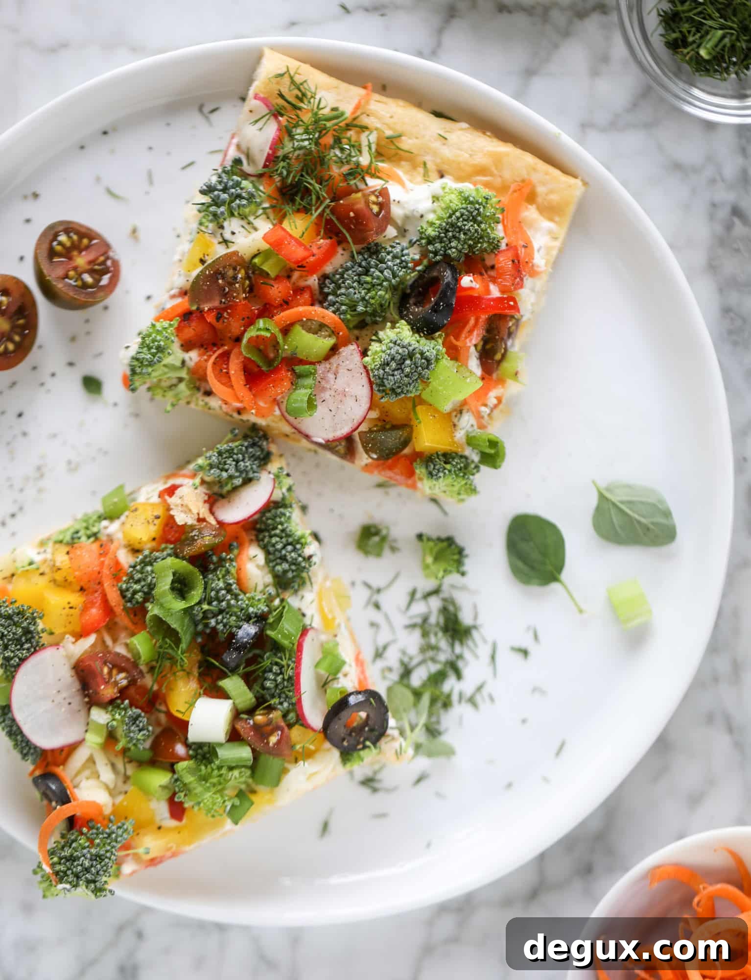 My mom's classic appetizer, the old school veggie pizza, is perfect for summer parties both indoor and out! A flaky pastry crust, a flavorful mascarpone greek yogurt base and tons of fresh chopped vegetables on top. It's a winning combination!