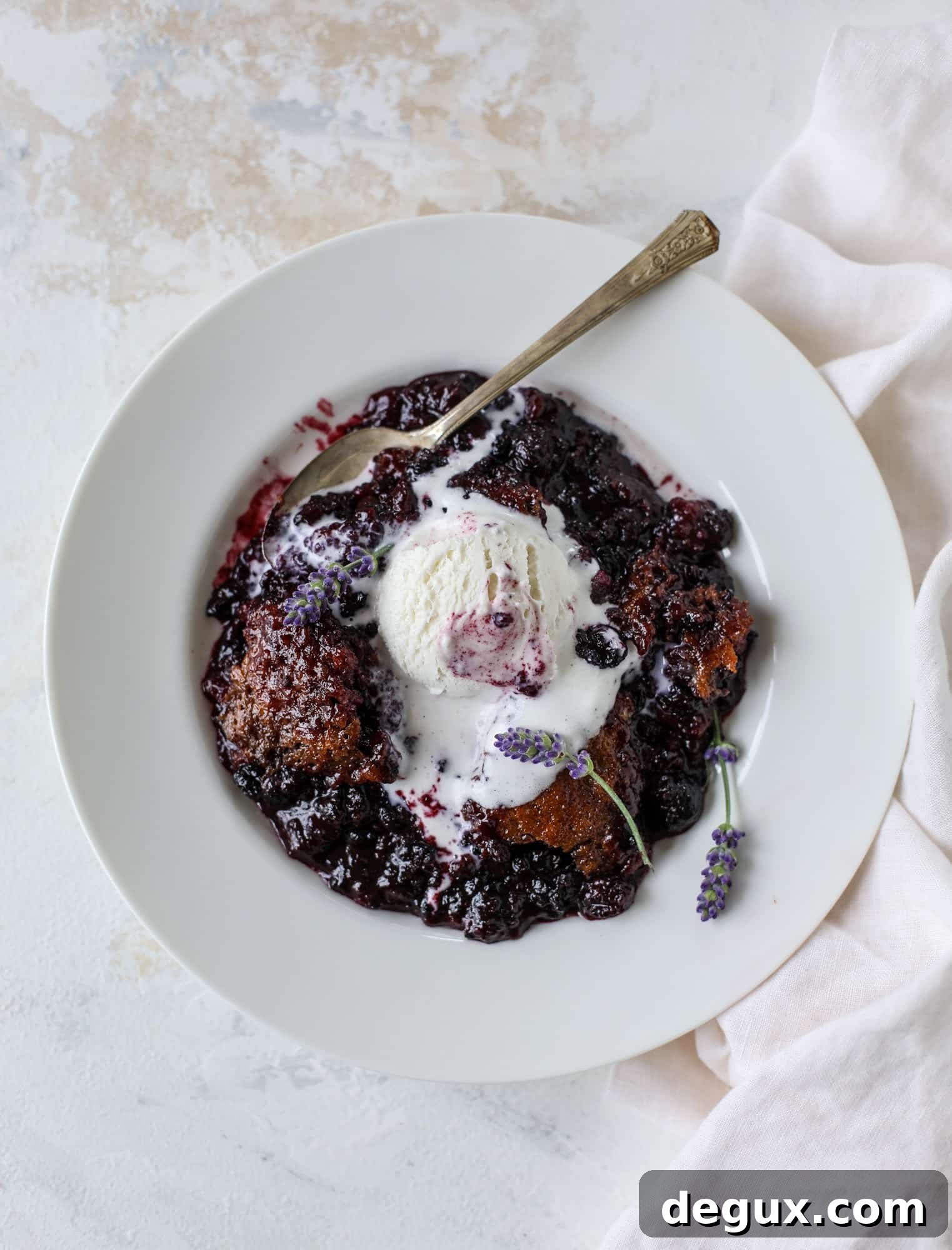 Black Raspberry and Lavender Cobbler Recipe for Summer Desserts 2 This black raspberry cobbler is a summer dream come true! The bursting black raspberries are rich and sweet, then add in a touch of lavender for incredible flavor and you're all set. The cobbler cake topping is perfect for vanilla ice cream. Win! I howsweeteats.com #black #raspberry #cobbler #lavender #summer #desserts #icecream