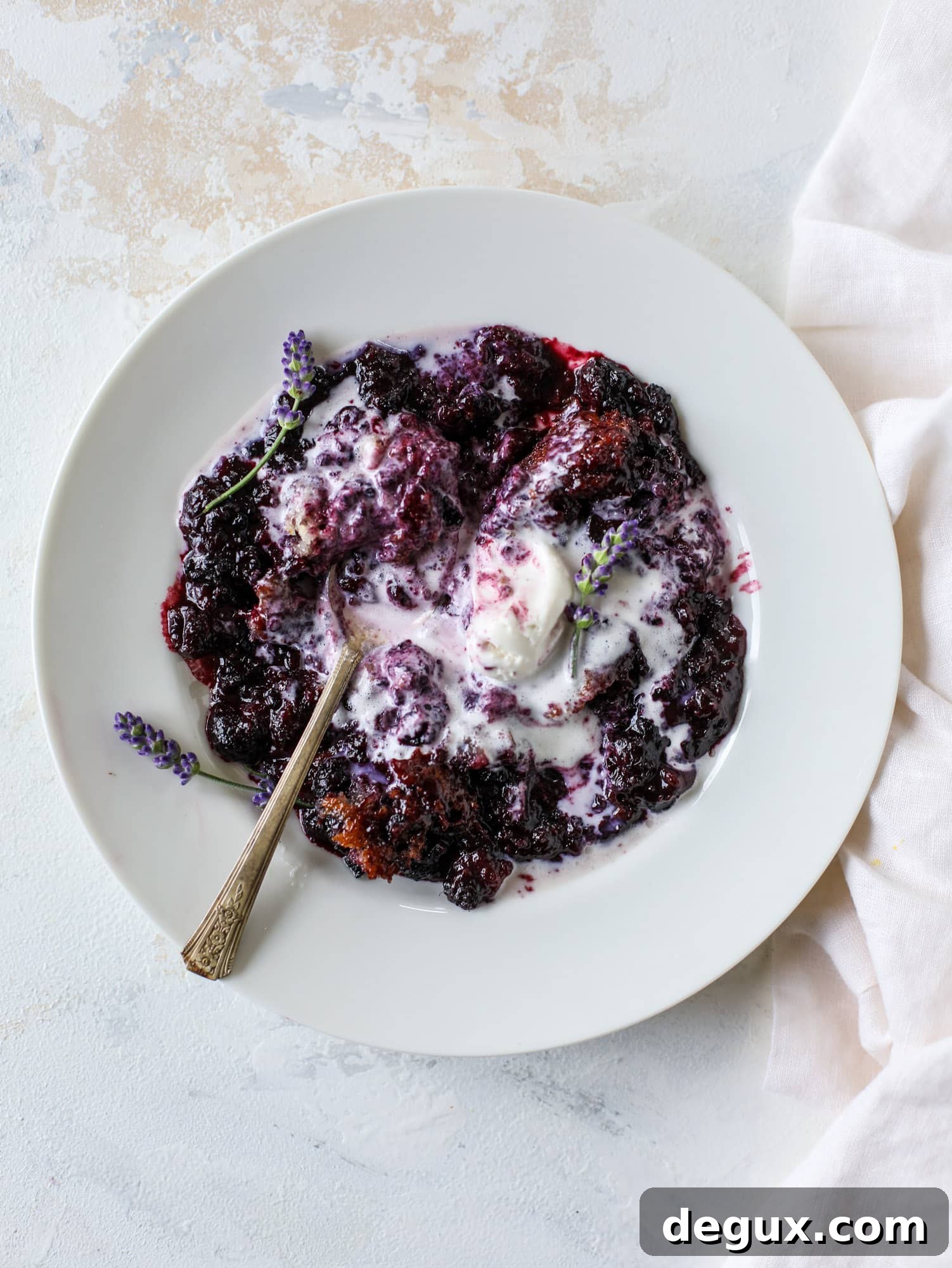 Black Raspberry and Lavender Cobbler Recipe for Summer Desserts 11 This black raspberry cobbler is a summer dream come true! The bursting black raspberries are rich and sweet, then add in a touch of lavender for incredible flavor and you're all set. The cobbler cake topping is perfect for vanilla ice cream. Win! I howsweeteats.com #black #raspberry #cobbler #lavender #summer #desserts #icecream