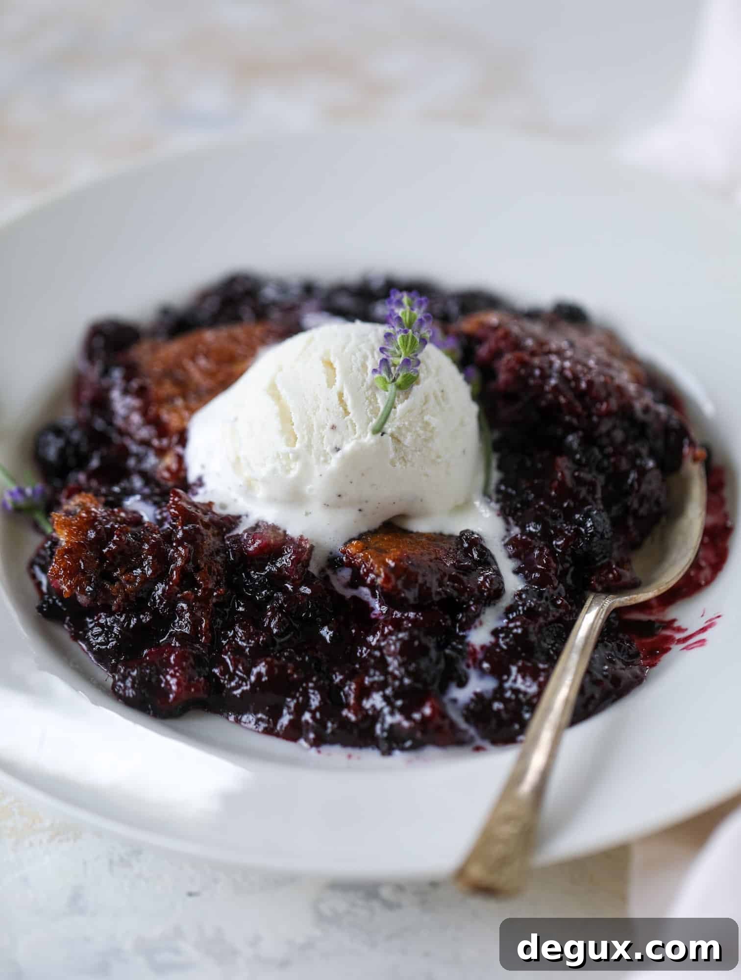 Black Raspberry and Lavender Cobbler Recipe for Summer Desserts 6 This black raspberry cobbler is a summer dream come true! The bursting black raspberries are rich and sweet, then add in a touch of lavender for incredible flavor and you're all set. The cobbler cake topping is perfect for vanilla ice cream. Win! I howsweeteats.com #black #raspberry #cobbler #lavender #summer #desserts #icecream