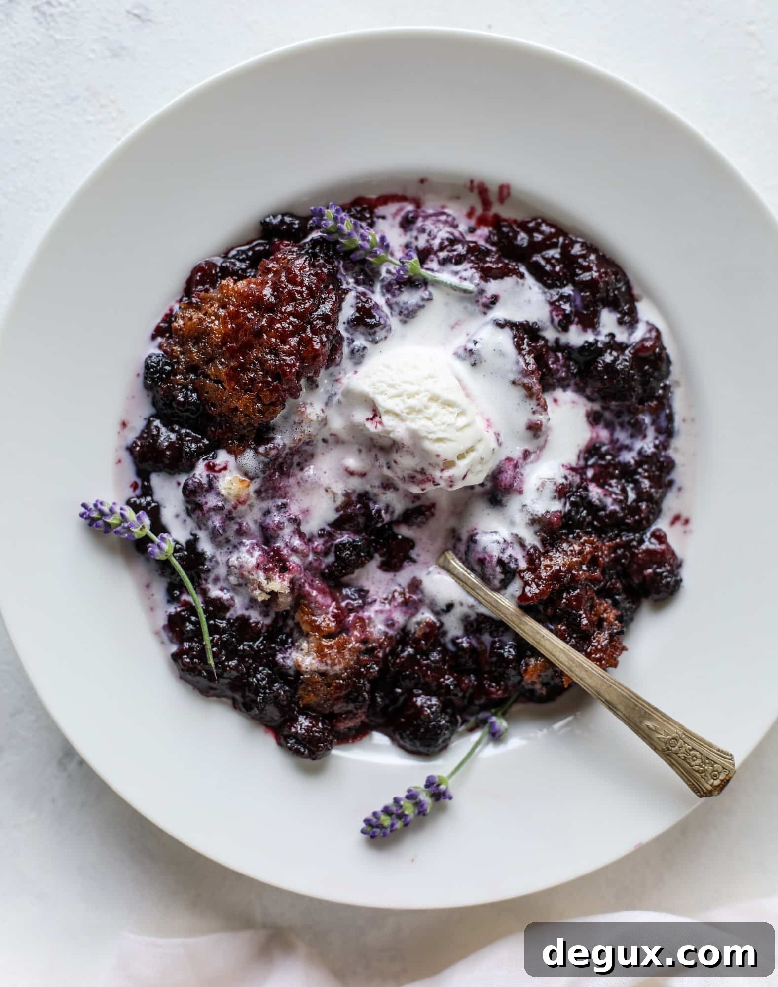 Black Raspberry and Lavender Cobbler Recipe for Summer Desserts 9 This black raspberry cobbler is a summer dream come true! The bursting black raspberries are rich and sweet, then add in a touch of lavender for incredible flavor and you're all set. The cobbler cake topping is perfect for vanilla ice cream. Win! I howsweeteats.com #black #raspberry #cobbler #lavender #summer #desserts #icecream