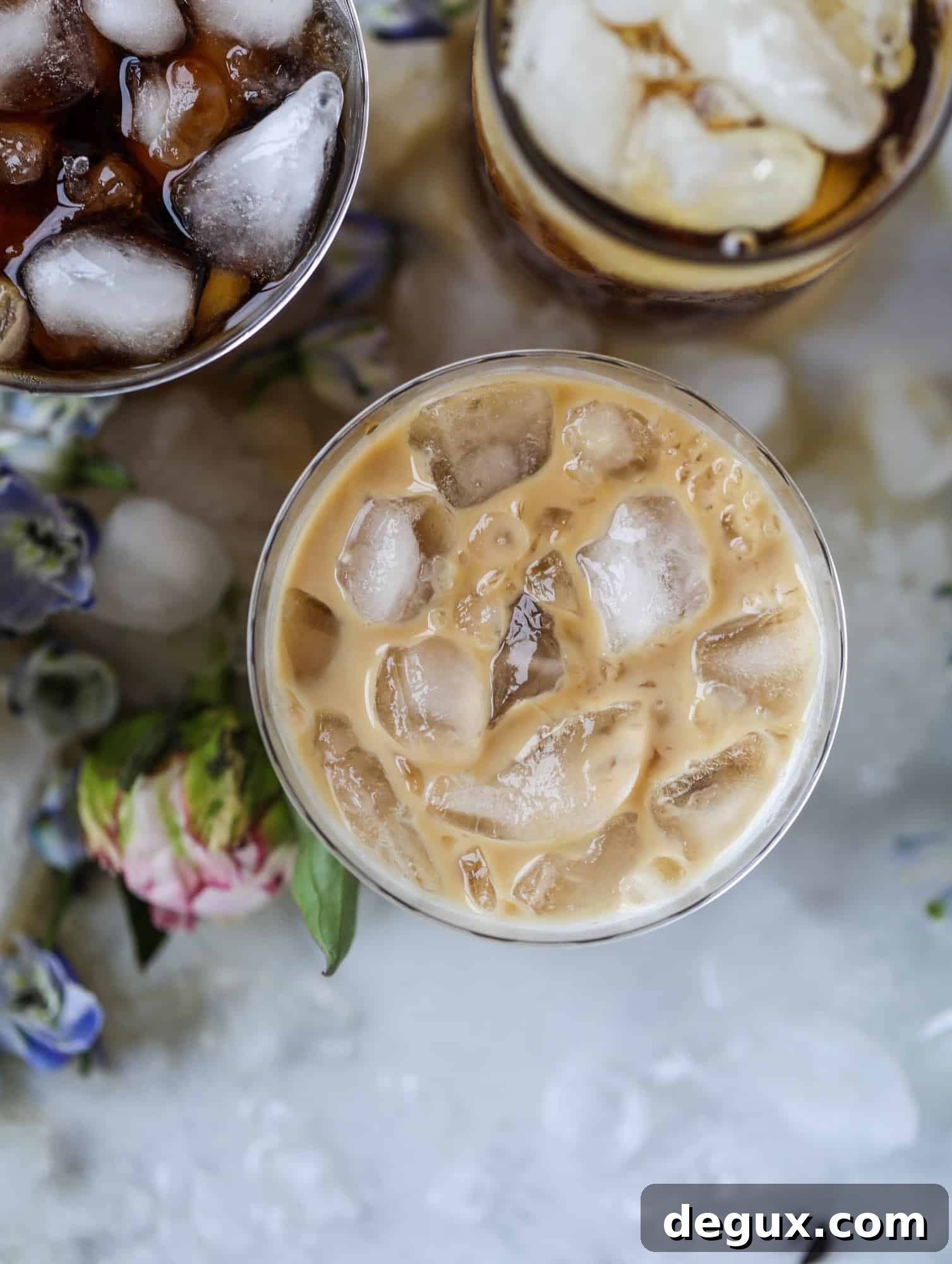 Sparkling Coconut Iced Coffee Recipe: Refreshing Summer Drink 8 Iced coconut coffee soda in a tall glass with a straw.