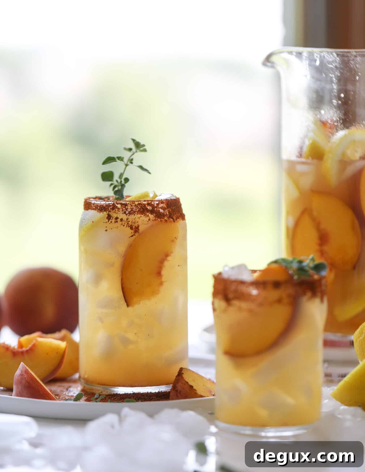 Cajun Peach Lemonade Recipe: Spicy-Sweet Southern Drink 2 This peach lemonade is super refreshing and a bit spicy for a hot and sunny summer day. It's sweet and fresh and the rim is dipped in a cajun seasoning, bringing the best bite of heat to this perfect summer drink. So fresh! I howsweeteats.com #peach #lemonade #cajun #summer #mocktail #lemon #drink