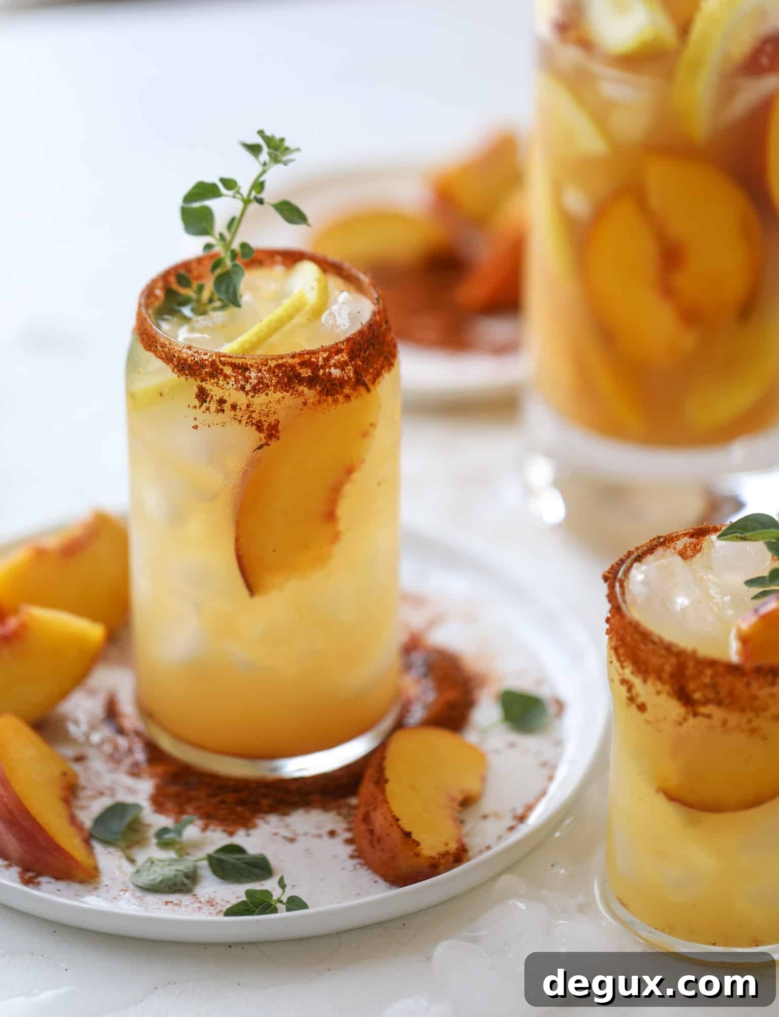 Cajun Peach Lemonade Recipe: Spicy-Sweet Southern Drink 8 This peach lemonade is super refreshing and a bit spicy for a hot and sunny summer day. It's sweet and fresh and the rim is dipped in a cajun seasoning, bringing the best bite of heat to this perfect summer drink. So fresh! I howsweeteats.com #peach #lemonade #cajun #summer #mocktail #lemon #drink