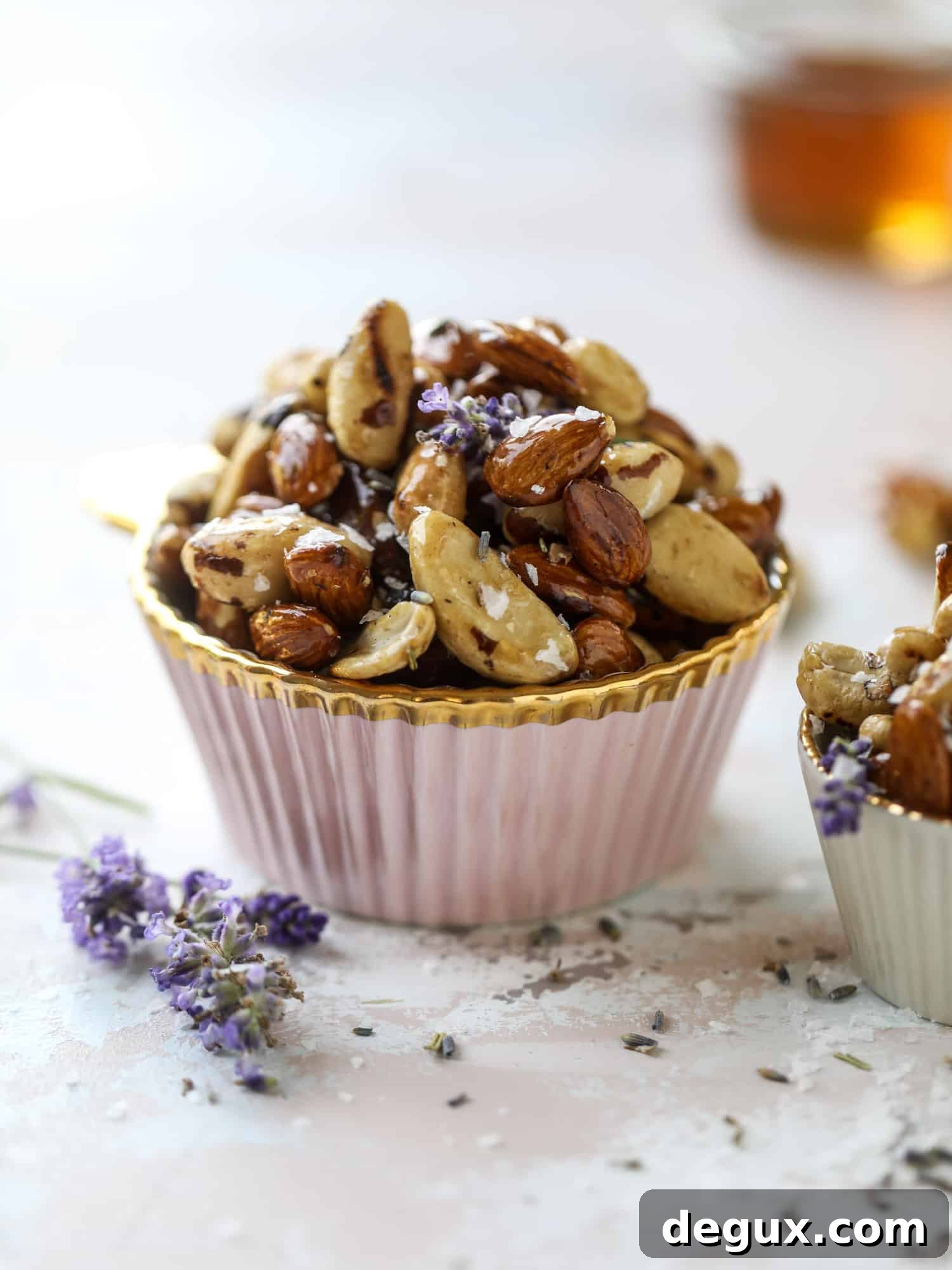 These salted honey lavender nuts are the best snack to make for when you're on the go or when you need a perfect appetizer for your dinner party. Roasted, sweet and salty with a hint of lavender makes these irresistible!