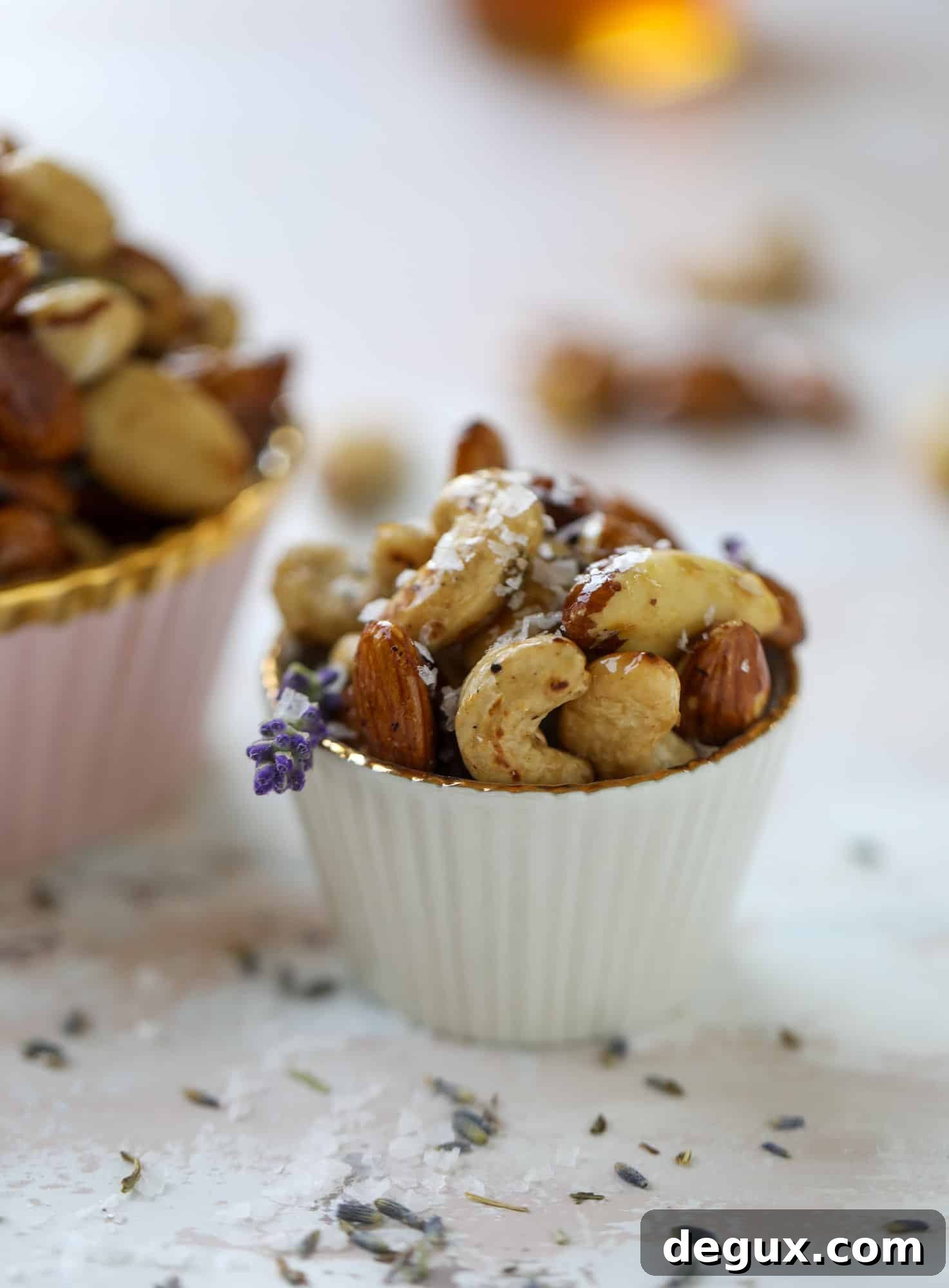 These salted honey lavender nuts are the best snack to make for when you're on the go or when you need a perfect appetizer for your dinner party. Roasted, sweet and salty with a hint of lavender makes these irresistible!