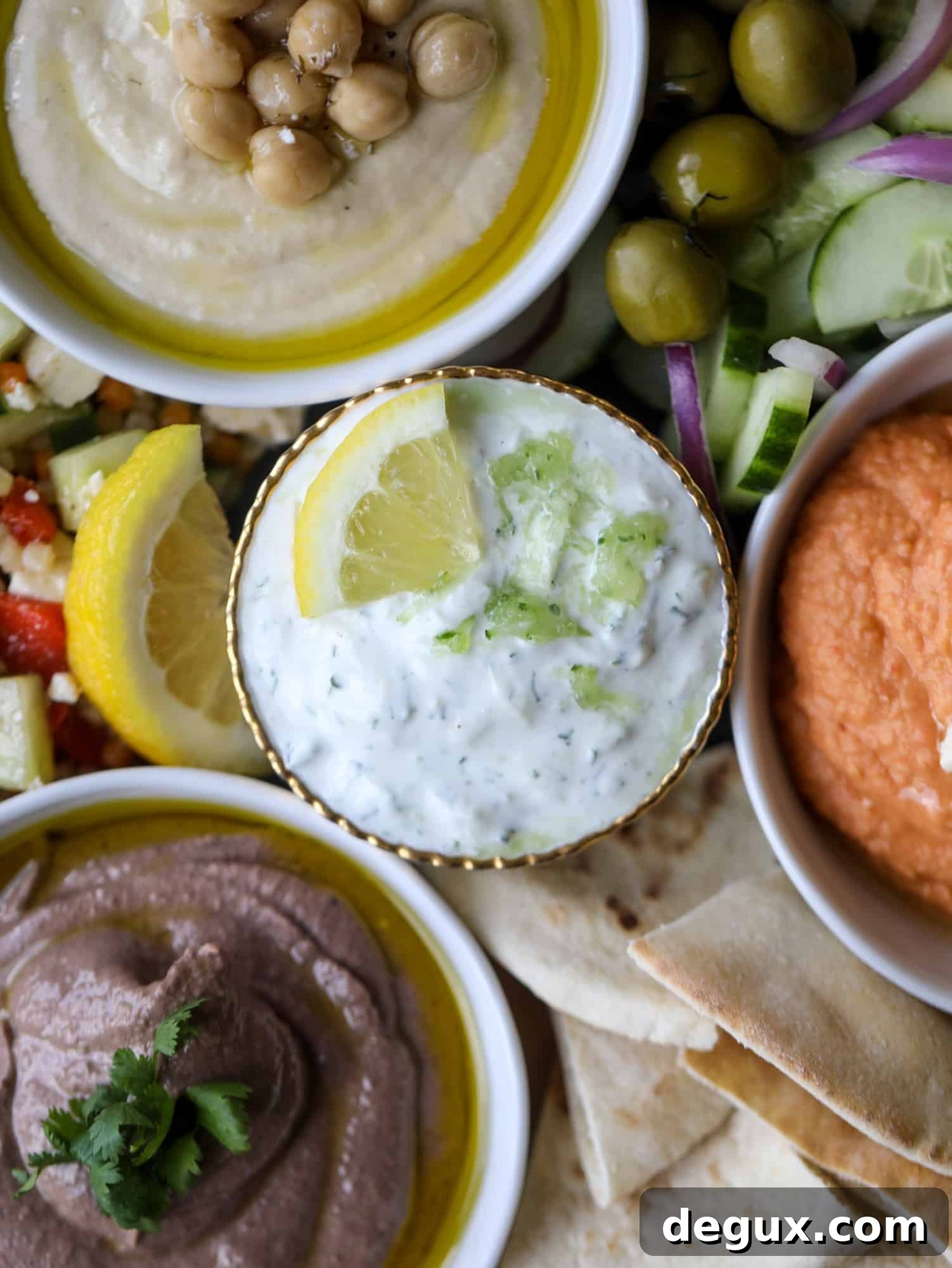 Caramelized onion hummus topped with herbs