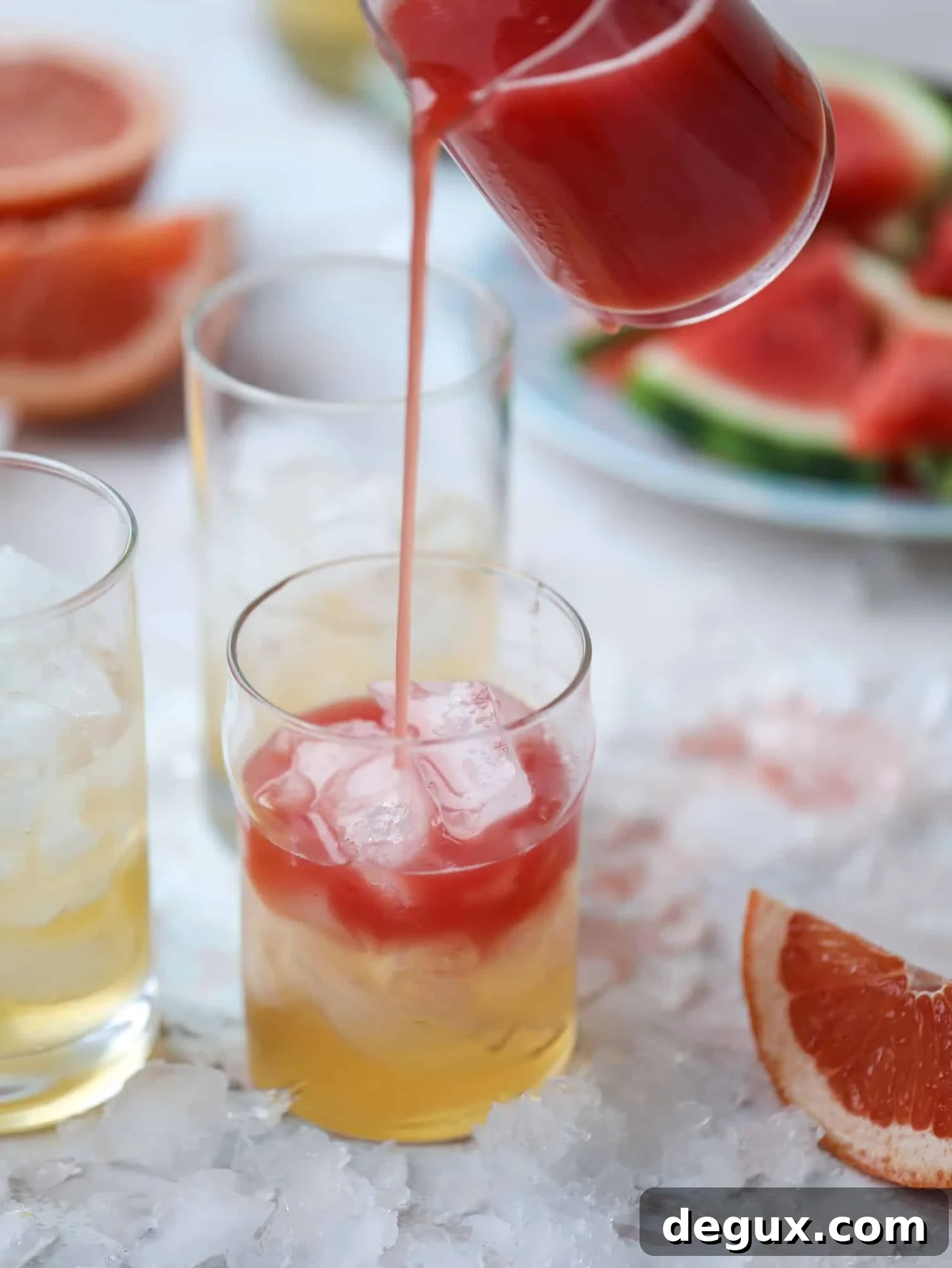 This watermelon grapefruit paloma cocktail is a summertime dream! Grapefruit syrup is super easy to make and when it's combined with fresh watermelon juice and tequila... oooh! Best happy hour ever. I howsweeteats.com #grapefruit #watermelon #paloma #cocktail #tequila