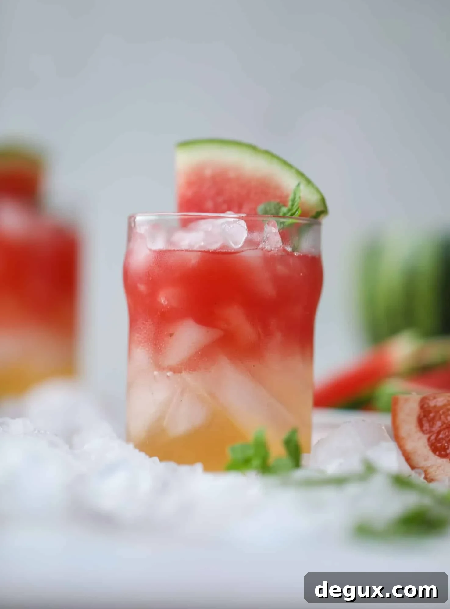 This watermelon grapefruit paloma cocktail is a summertime dream! Grapefruit syrup is super easy to make and when it's combined with fresh watermelon juice and tequila... oooh! Best happy hour ever. I howsweeteats.com #grapefruit #watermelon #paloma #cocktail #tequila