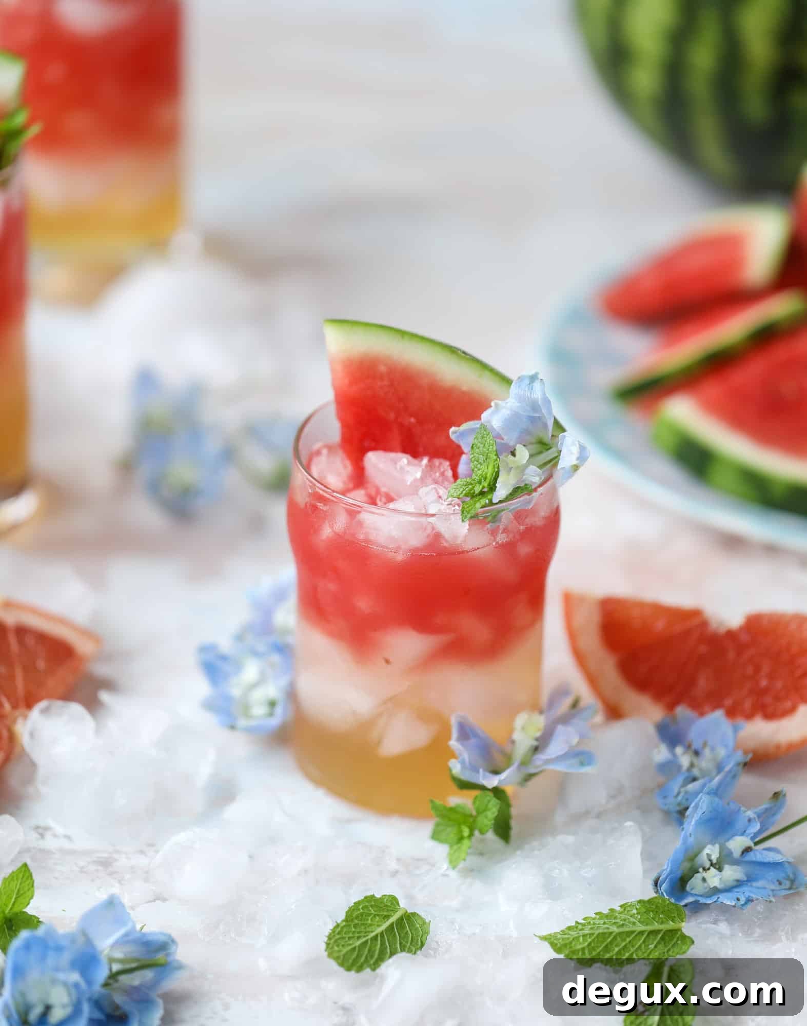 This watermelon grapefruit paloma cocktail is a summertime dream! Grapefruit syrup is super easy to make and when it's combined with fresh watermelon juice and tequila... oooh! Best happy hour ever. I howsweeteats.com #grapefruit #watermelon #paloma #cocktail #tequila