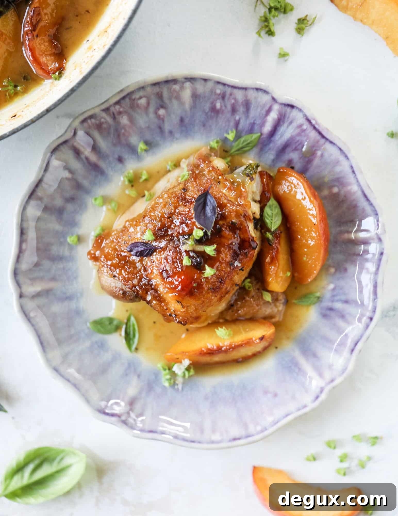One-Pan Peach and Basil Chicken Skillet Recipe 8 This amazing summertime one pot chicken is made with fresh peaches and basil and takes no time at all. The sweet and savory combination is perfect for a quick weeknight meal; the sauce is amazing for dipping and the chicken is flavorful as can be. I howsweeteats.com #chicken #peach #basil #easy #dinner #recipe #summer #healthy