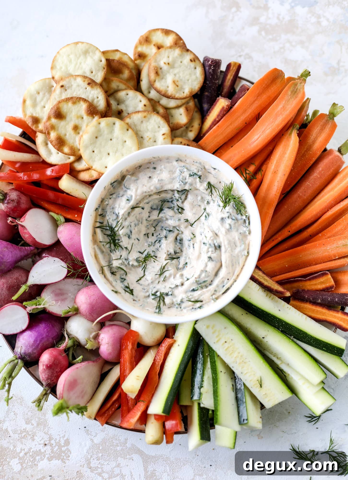 Smoky Cool Ranch Kale Dip Recipe — Tangy, Creamy Party Dip 6 This greek yogurt ranch dip is fabulous for a summertime pool tip and it's full of greens! Made with a homemade ranch spice seasoning, lots of shredded greek kale and greek yogurt, it's the perfect dip for crudite or chips! I howsweeteats.com #kale #greek #yogurt #ranch #dip #healthy #snacks